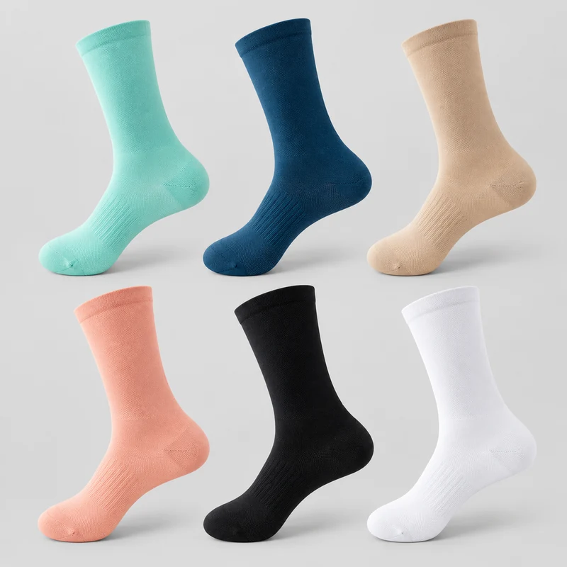 Solid-colour crew cycling socks in mint, deep blue, sand, coral, black and white