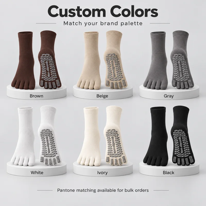 Brown, beige, grey, white, ivory and black five-toe crew grip socks displayed in upper and sole views on plinths