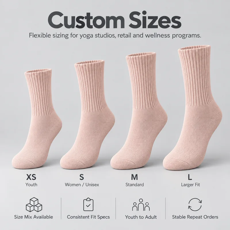 Blush pink ribbed crew yoga socks with XS, S, M and L size references for youth, women and unisex ranges