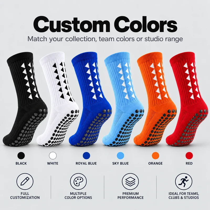 Round-dot football grip socks shown in black, white, royal blue, sky blue, orange and red with contrasting triangle leg motifs
