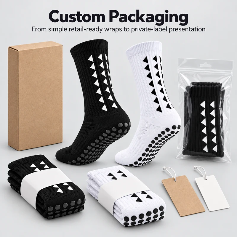 Black and white round-dot football grip socks with a box, resealable bag, paper bands and hangtag examples
