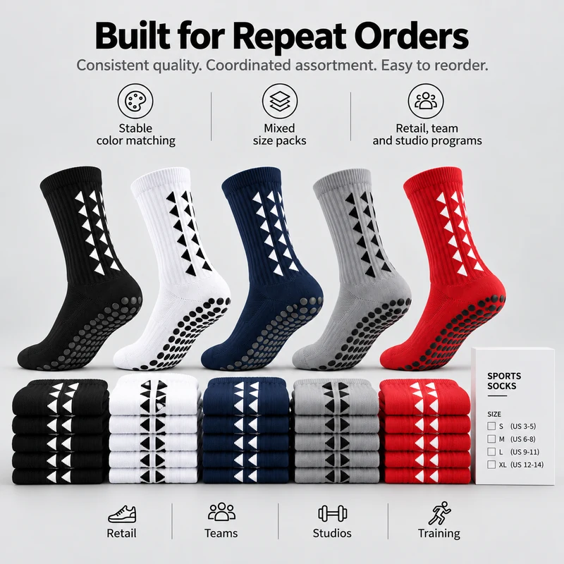 Round-dot football grip socks in black, white, navy, grey and red with folded pairs and an example size label for repeat orders