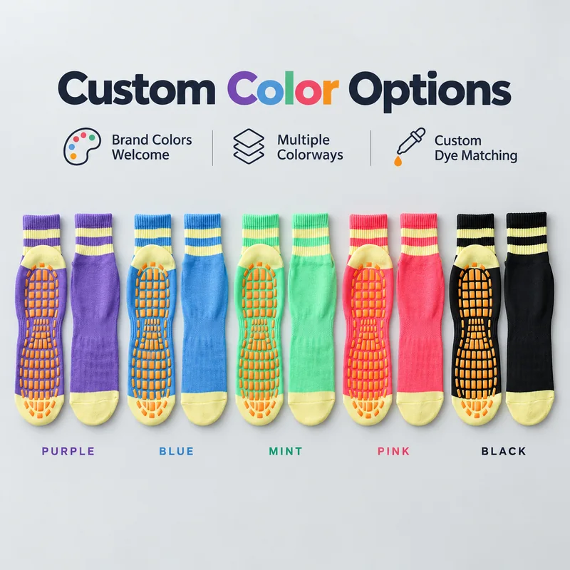 Five pairs of purple, blue, mint, pink and black trampoline socks with yellow accents and orange grip pads arranged in sole and upper views