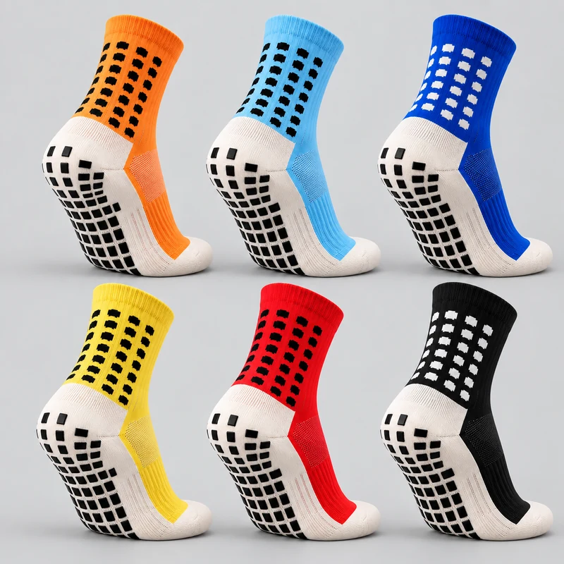 Two-tone football grip socks in orange, sky blue, royal blue, yellow, red and black with light-coloured feet and black sole pads