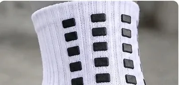 Close-up of rectangular grip elements on the sock